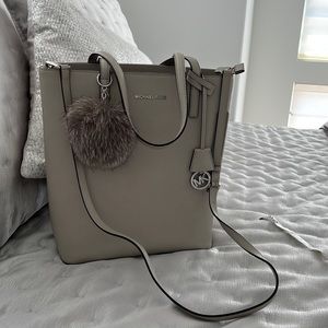 Michael Kors Pewter Leather Tote style Purse with fur puff ball adornment